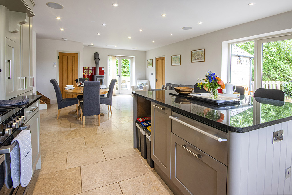 Dining table in kitchen with seating for 12